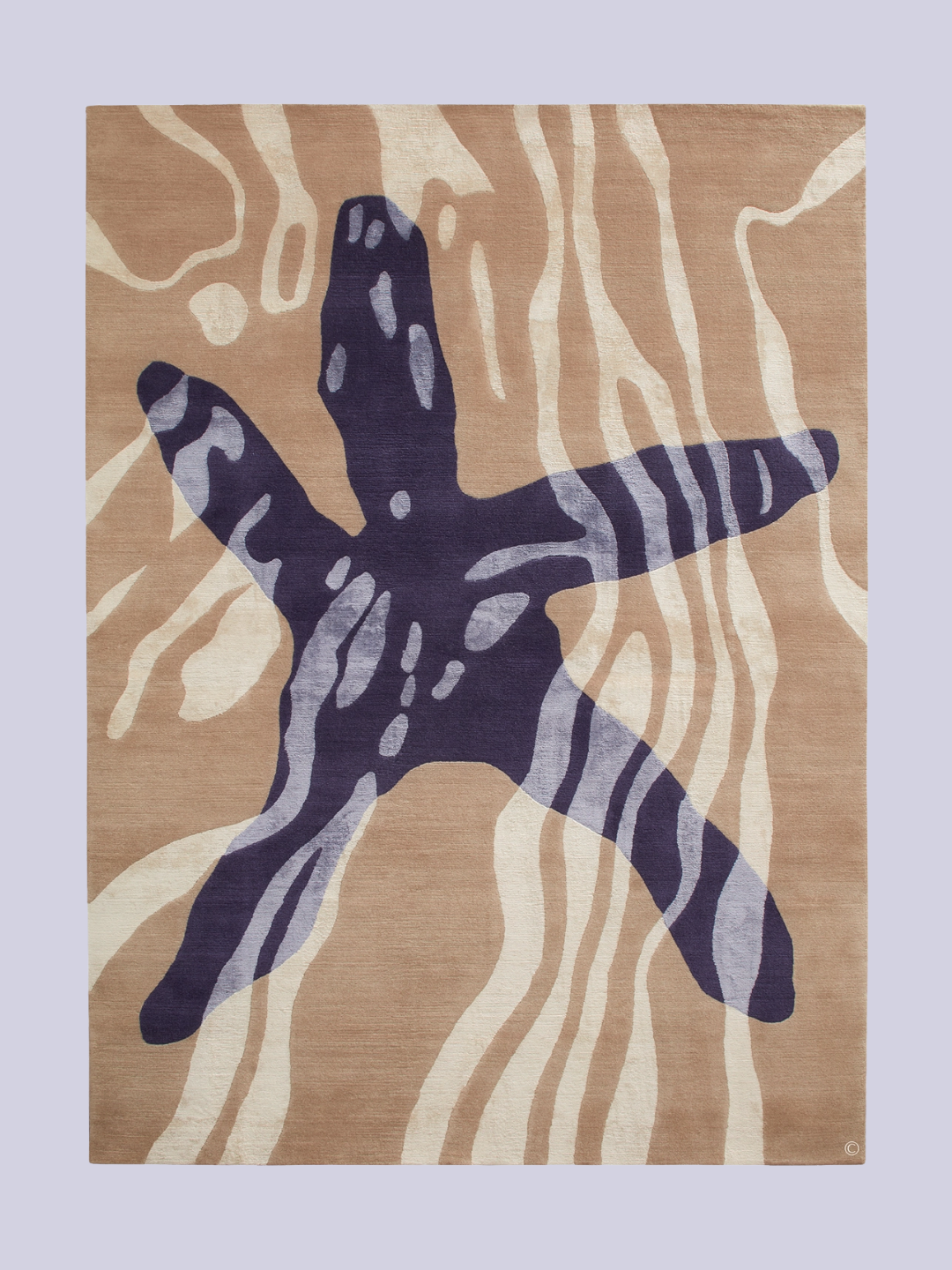 A beige rug with a purple starfish from Deirdre Dyson