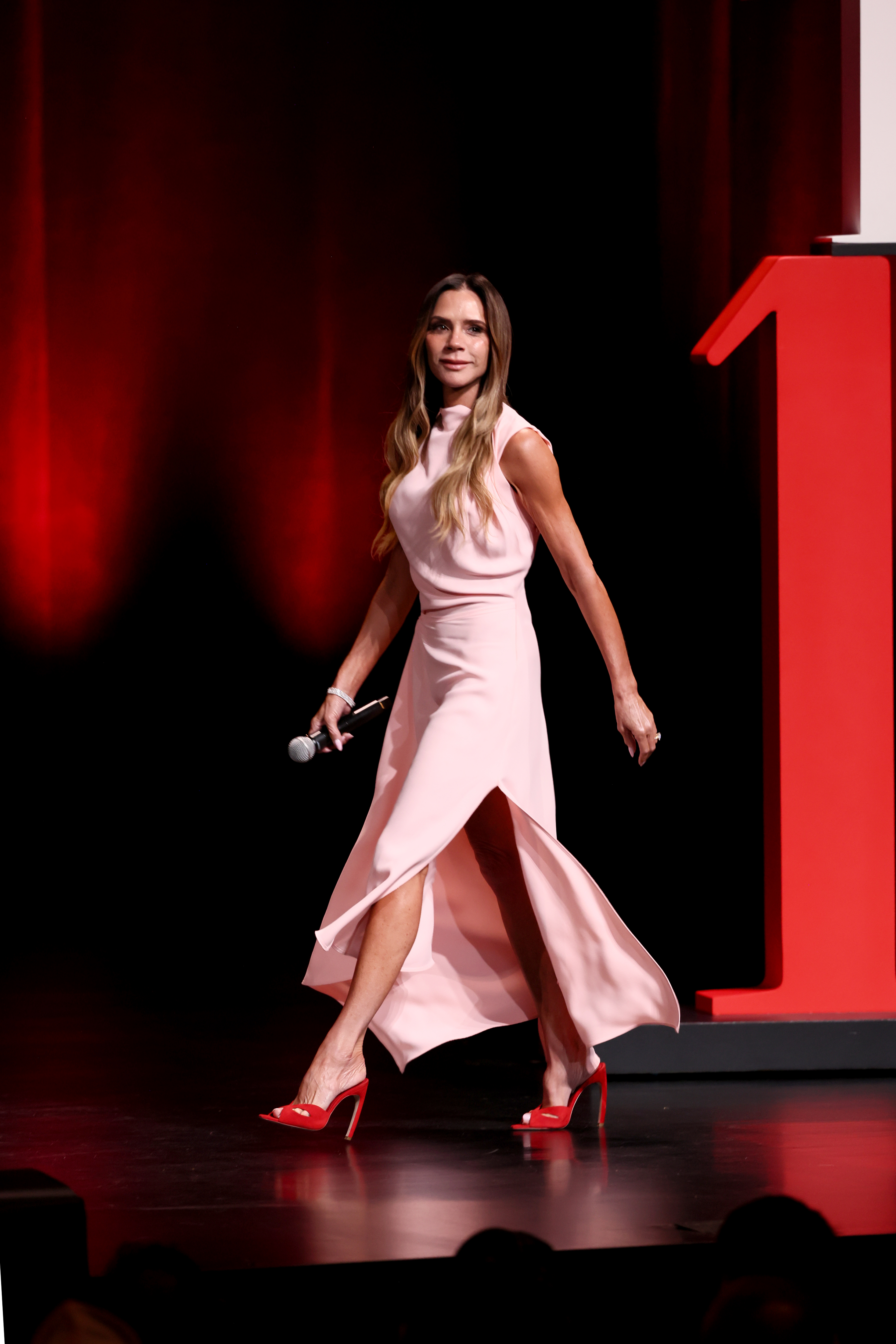 Victoria Beckham attended the Time100 summit in spring 2026's powder pink and strawberry red color combination
