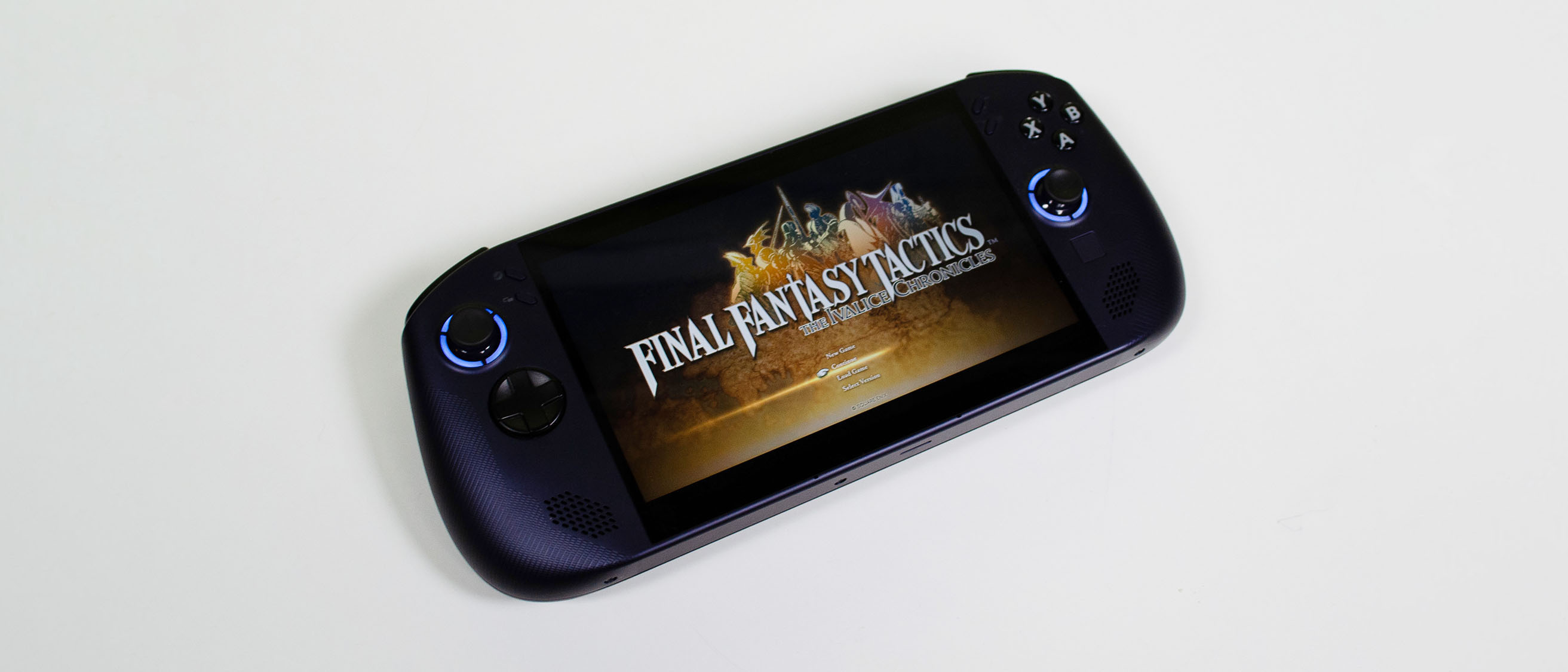 A Lenovo Legion Go S (SteamOS) on a desk playing Final Fantasy Tactics: The Ivalice Chronicles