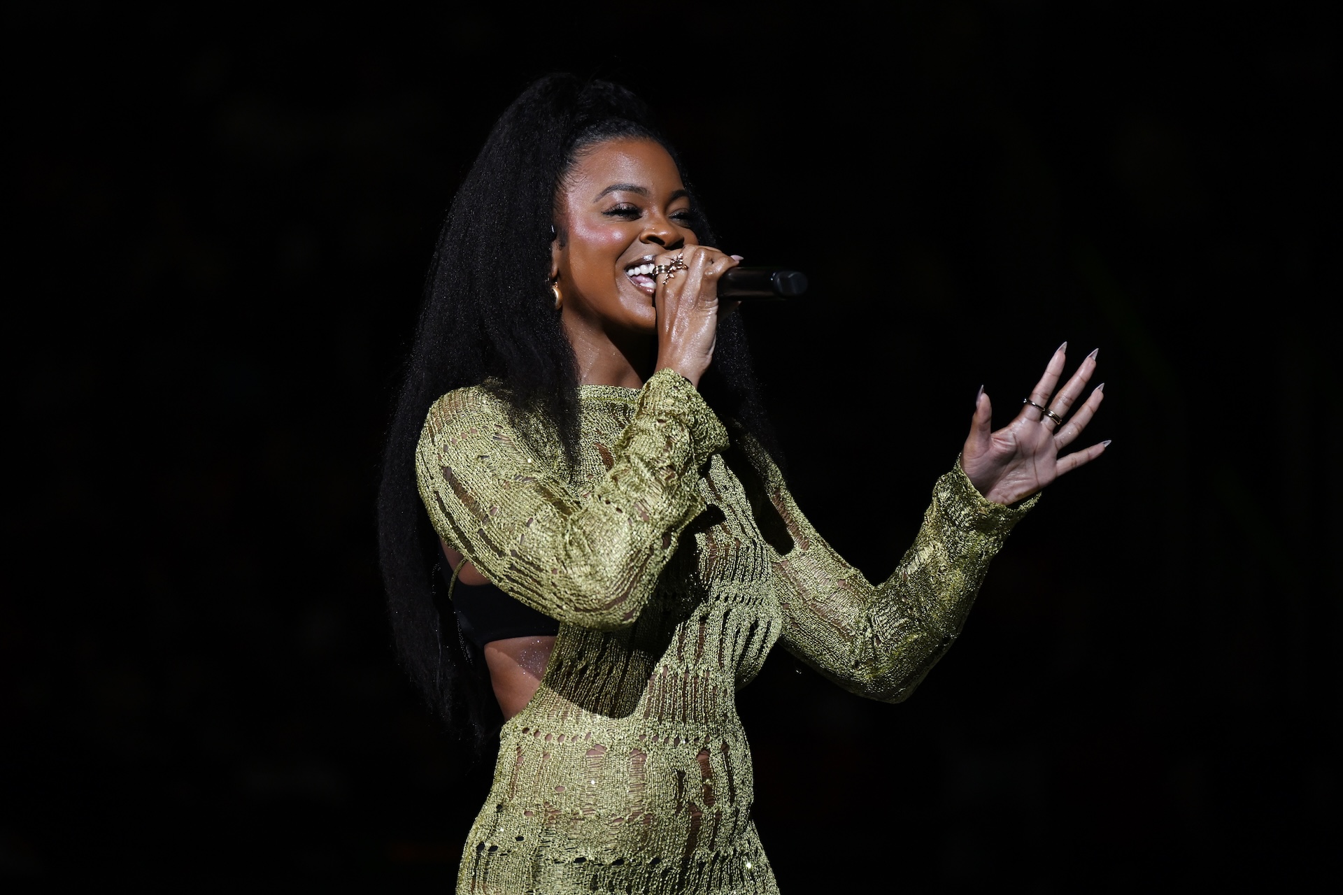 Singer Ari Lennox performs during half time in the game between the Indiana Fever and the Atlanta Dream at State Farm Arena on May 22, 2025 in Atlanta, Georgia