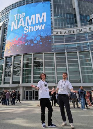 GW.com Editor-in-Chief Michael Astley-Brown (left) and Senior Staff Writer Matt Owen, pictured soaking up the sun in front of the NAMM 2025 banner-adorned Anaheim Convention Center in Anaheim, California