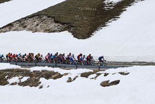 The Giro d'Italia peloton races past the snow on stage 7 to Gran Sasso d'Italia