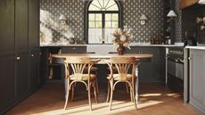 Dark gray kitchen with wood chairs, art deco wallpaper, marble countertop, wall lights, wooden floor, 