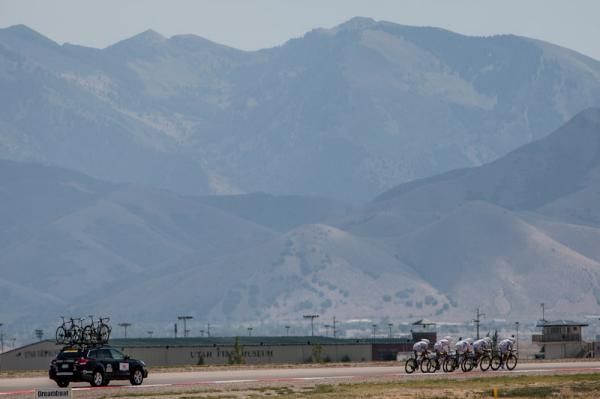 Teams rode to a big mountain backdrop which the race will soon climb.