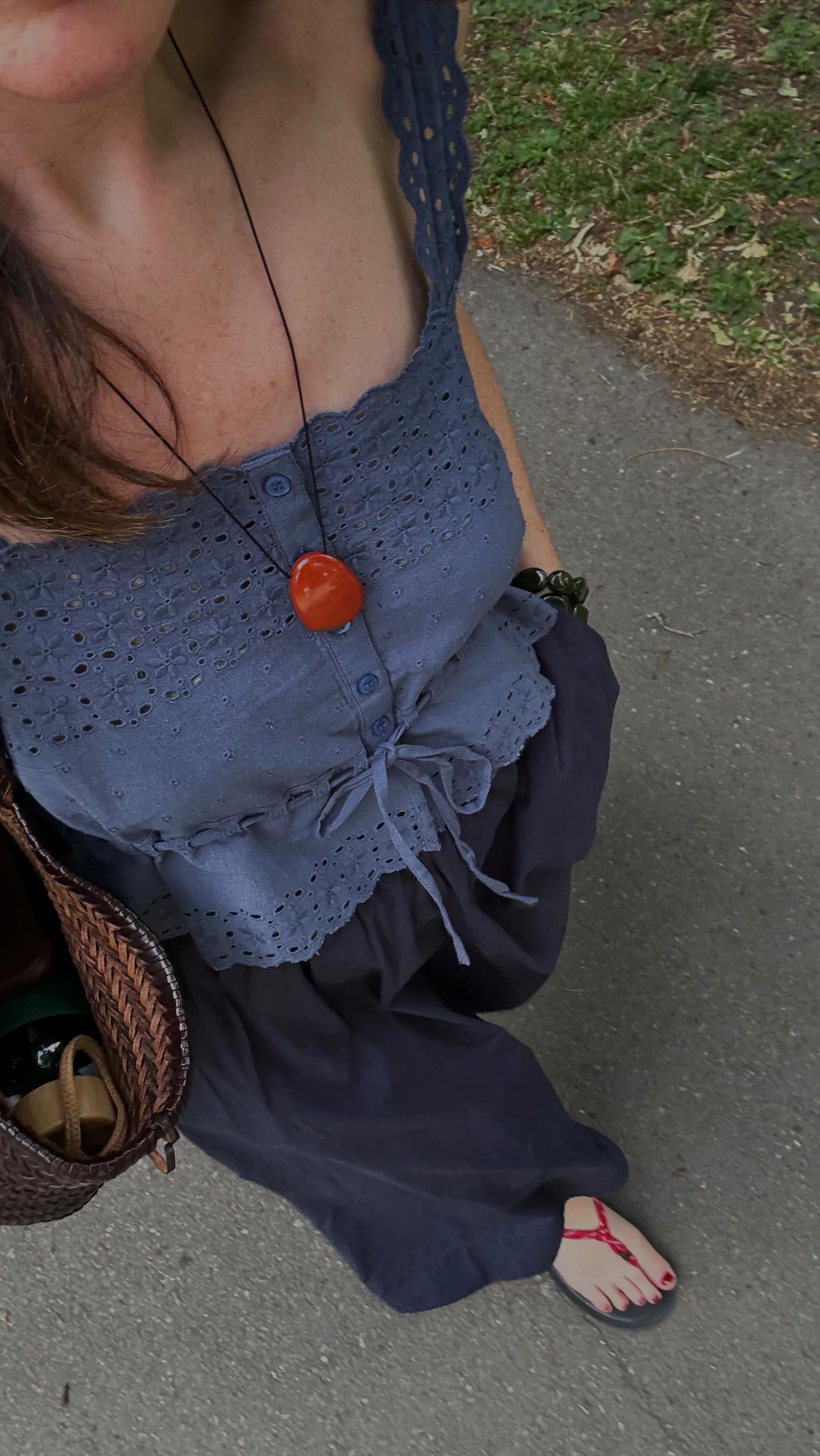@francescasaffari's image wearing a navy blue Broderie Anglaise top, one of the key summer trends for 2025.