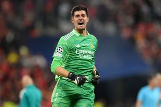 Thibaut Courtois of Real Madrid celebrates following their sides victory in the UEFA Champions League final match between Liverpool FC and Real Madrid at Stade de France on May 28, 2022 in Paris, France.