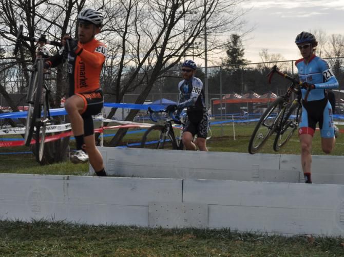 Jared Nieters (SEAVS/Haymarket), Robert Marion (American Classic Pro Cyclocross Team) and Andrew Dillman (Bob's Red Mill) run the barriers.