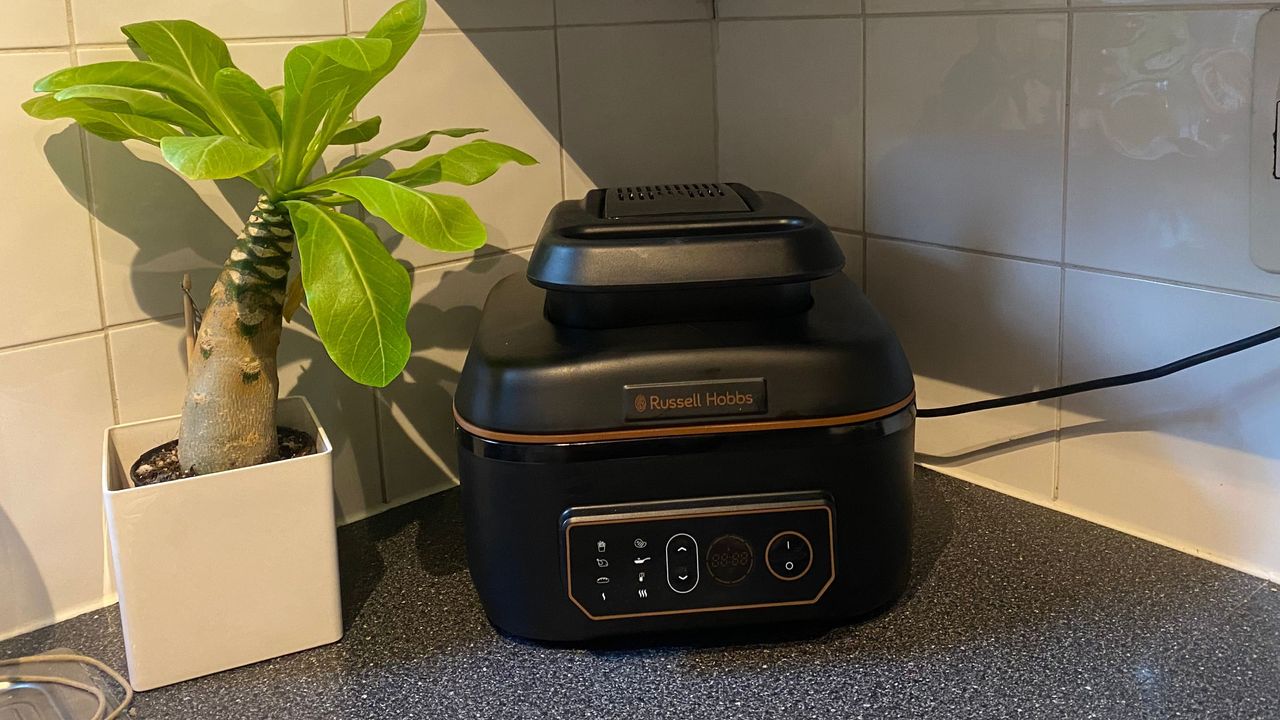 Russell Hobbs SatisFry on kitchen worktop beside plant