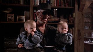 The Dark Half Timothy Hutton as George Stark holding babies