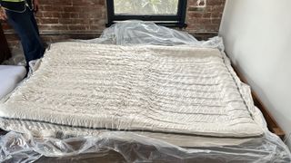 The Avocado Green Mattress during the delivery/set-up process