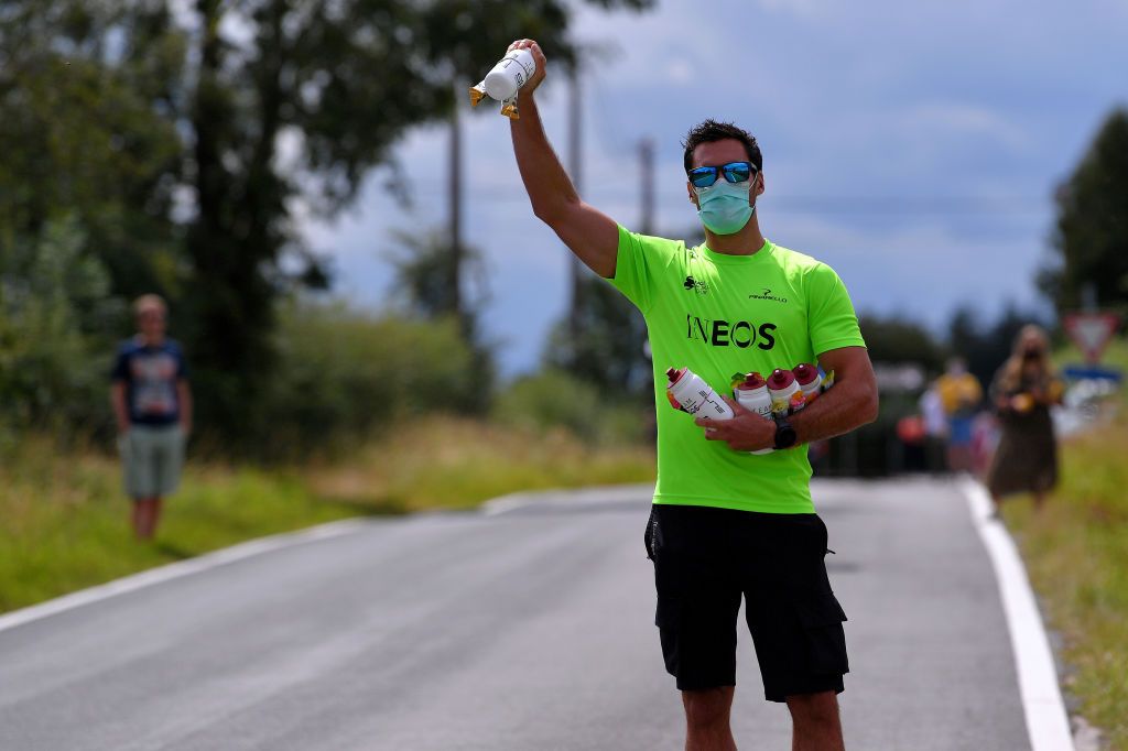 VISE BELGIUM AUGUST 18 Soigneur of Team INEOS Feed Zone Elite Bottles Covid safety measures during the 41st Tour de Wallonie 2020 Stage 3 a 192km stage from Montzen to Vise TourdeWallonie TRW2020 on August 18 2020 in Vise Belgium Photo by Luc ClaessenGetty Images