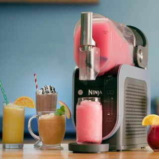 Ninja Slushi on a countertop with drinks