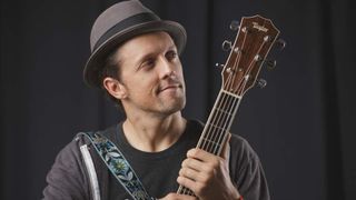 American singer-songwriter Jason Mraz, photographed with his Taylor 714ce acoustic guitar