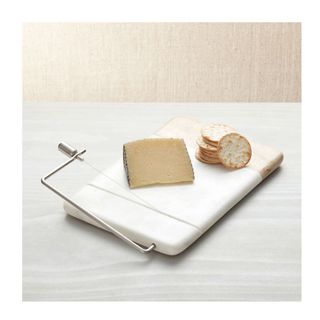 marble and wood cheese board with cutter