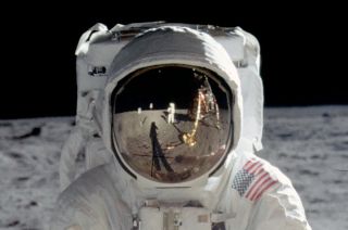 A close-up of an iconic photograph of Buzz Aldrin is serving as the basis for the reverse design of U.S. Mint coins commemorating the 50th anniversary of Apollo 11, as directed by Congress.
