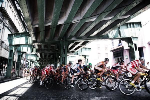 The pace quickens as the pack rides through the cobblestones at the bottom of the Manayunk Wall.