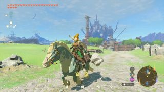 Link rides a horse infront of Hyrule Castle in Tears of the Kingdom