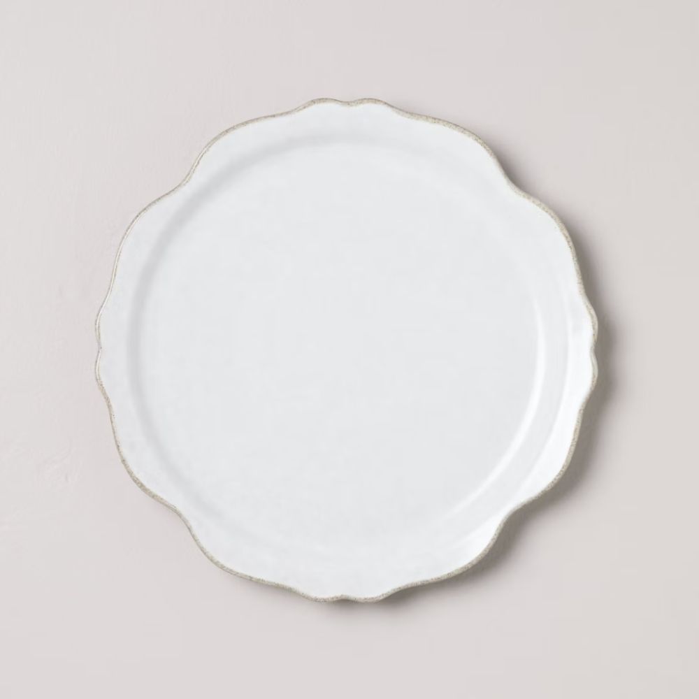 White carved edge plate with stoneware glaze