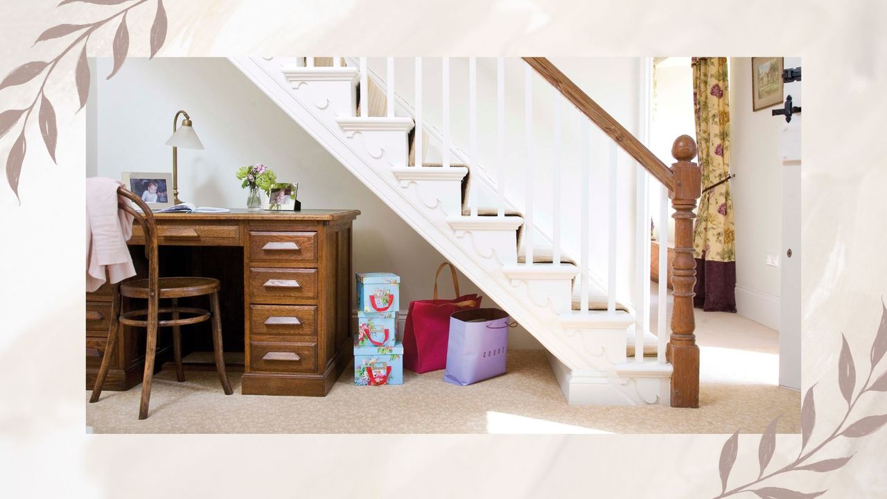 picture of hallway and staircase with bags stored beneath it 