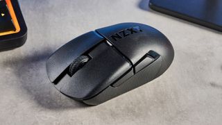 A black NZXT Lift Elite Wireless gaming mouse