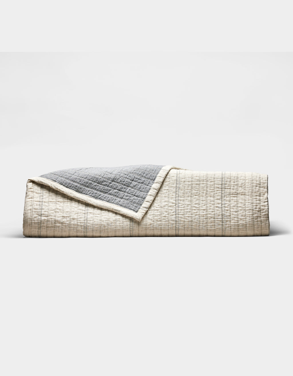 textured blue and gray coverlet