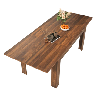 dark wood dining table with decor on top