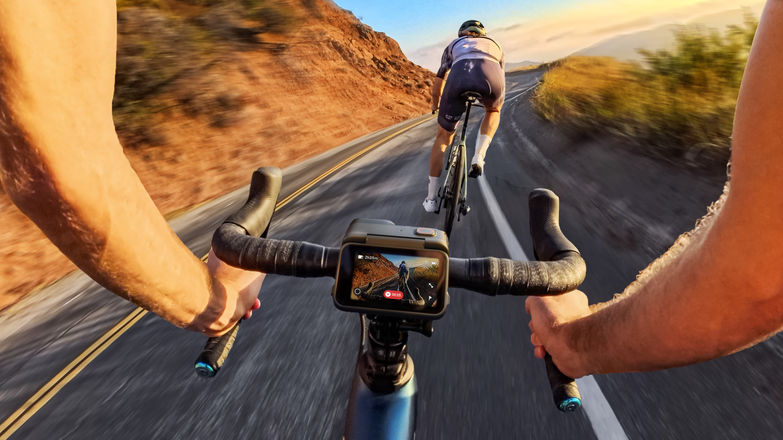 Insta360 Ace Pro mounted to handlebars of a roadbike going at speed on a desert road