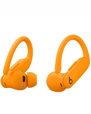 Beats Powerbeats Pro 2 in orange on white background.