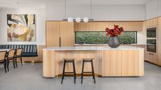 timber kitchen with window backsplash