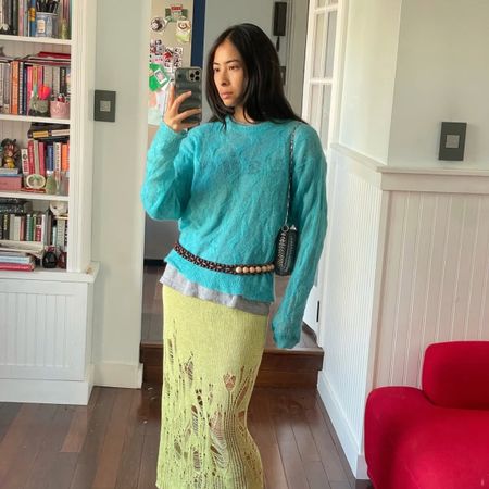 Michelle Li in a teal sweater