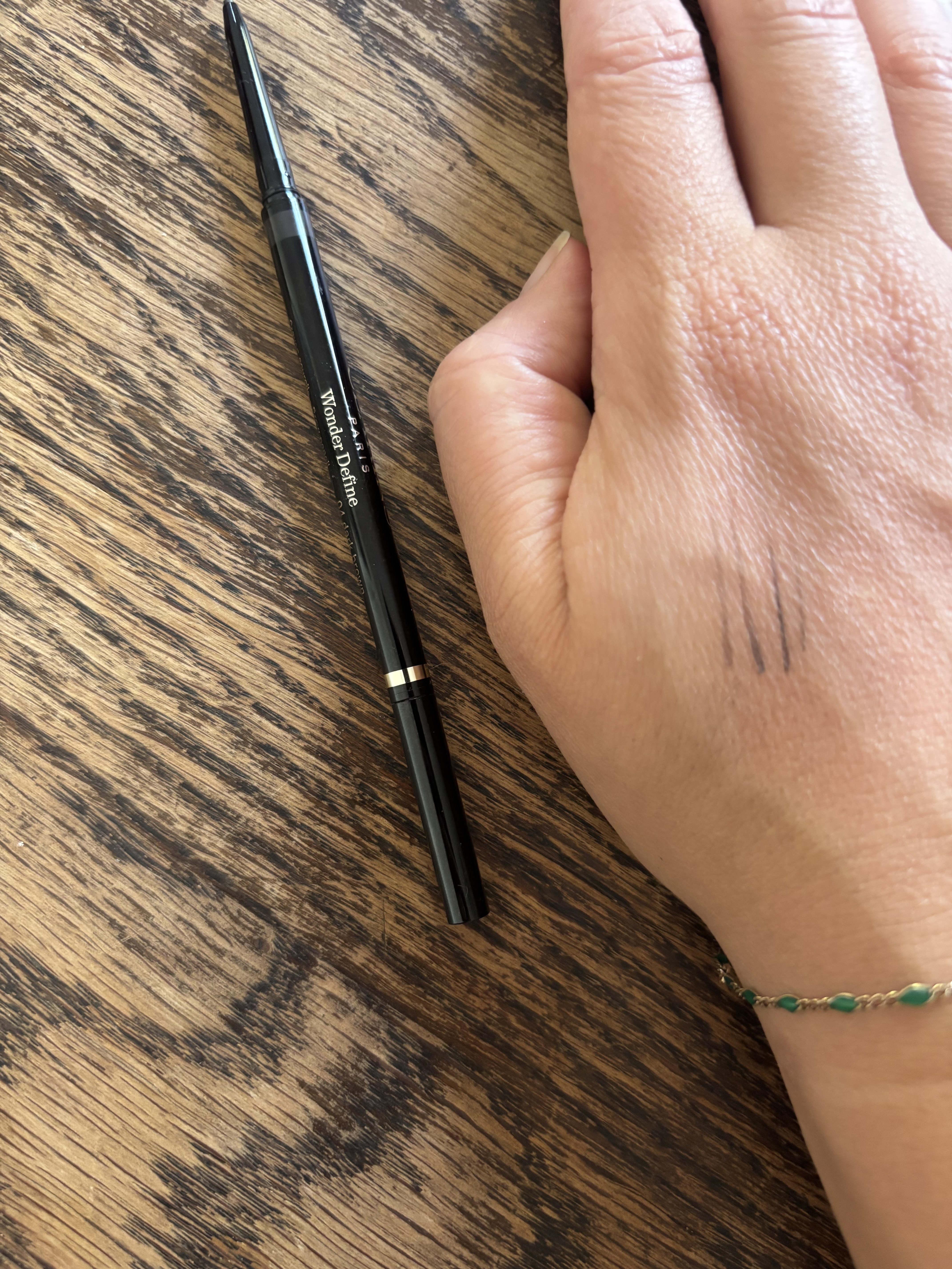 Beauty editor Perdita swatching the Clarins Wonder Brow on her hand