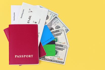 Passport with cash and credit cards. 