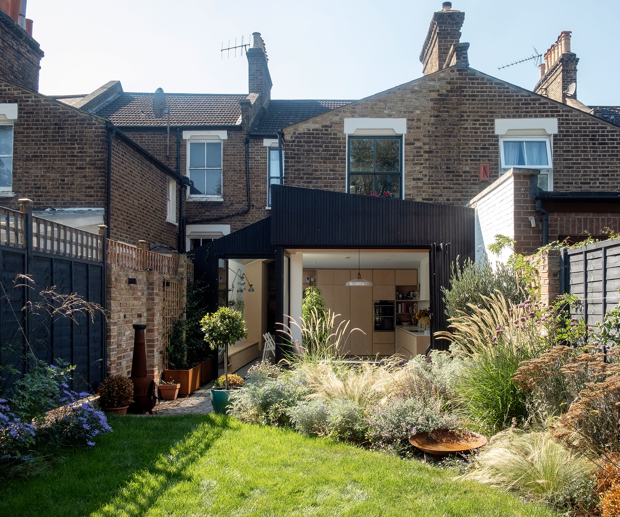 charred timber kitchen extension on terraced house