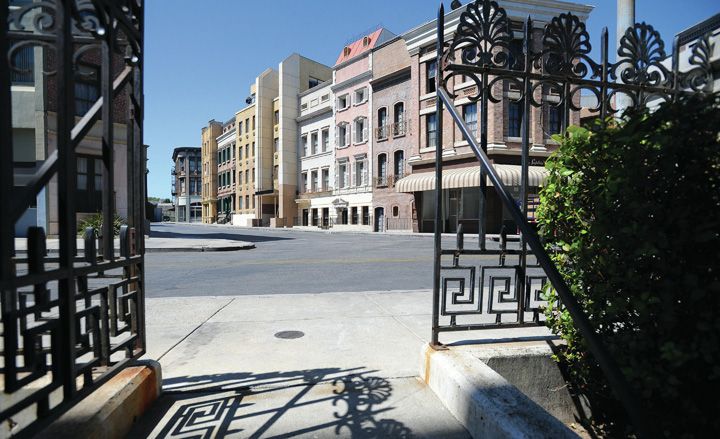 Iron gate to row of buildings