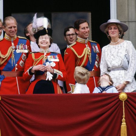 A baked potato with caviar alongside Royal Family members joining Queen Elizabeth II on the Buckingham balcony, including Princess Diana in a white floral dress and matching hat and King Charles
