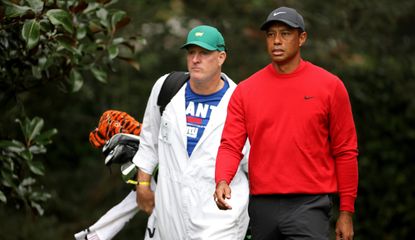 Tiger and LaCava walk