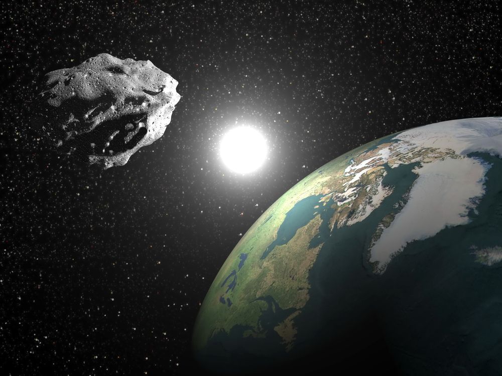 An artist&#039;s concept of an asteroid, poised to strike the Earth.