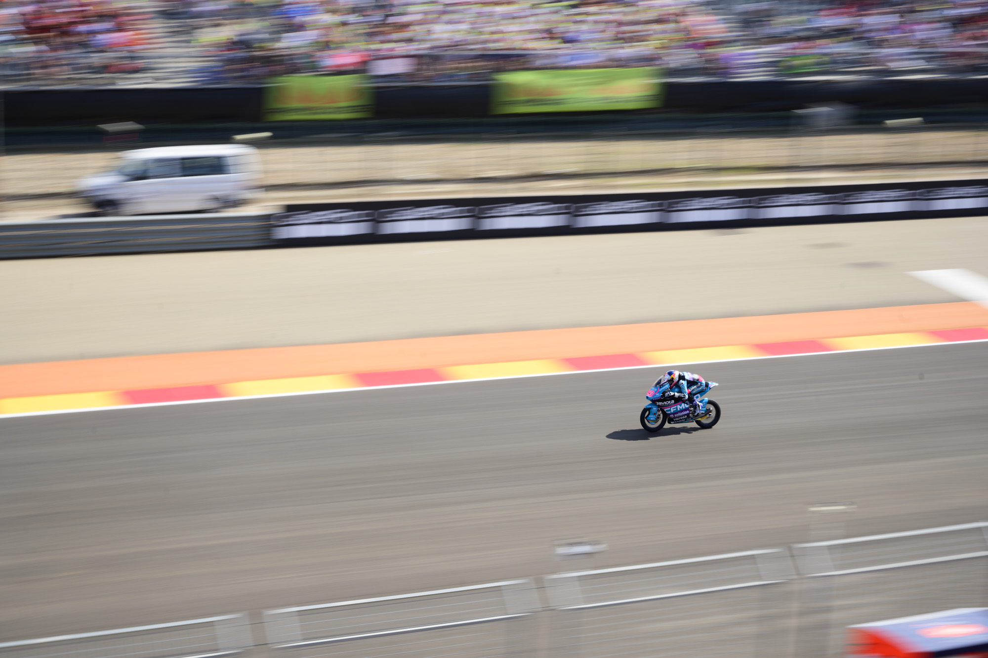 MotoGP racetrack with motorbike riders at full speed