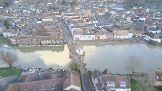 Photo of a river running through a town taken with a V-Copter Falcon Mini