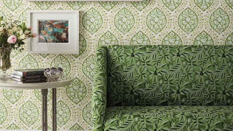 Nina Campbell on using green in interior design, green wallpaper and chair in living room
