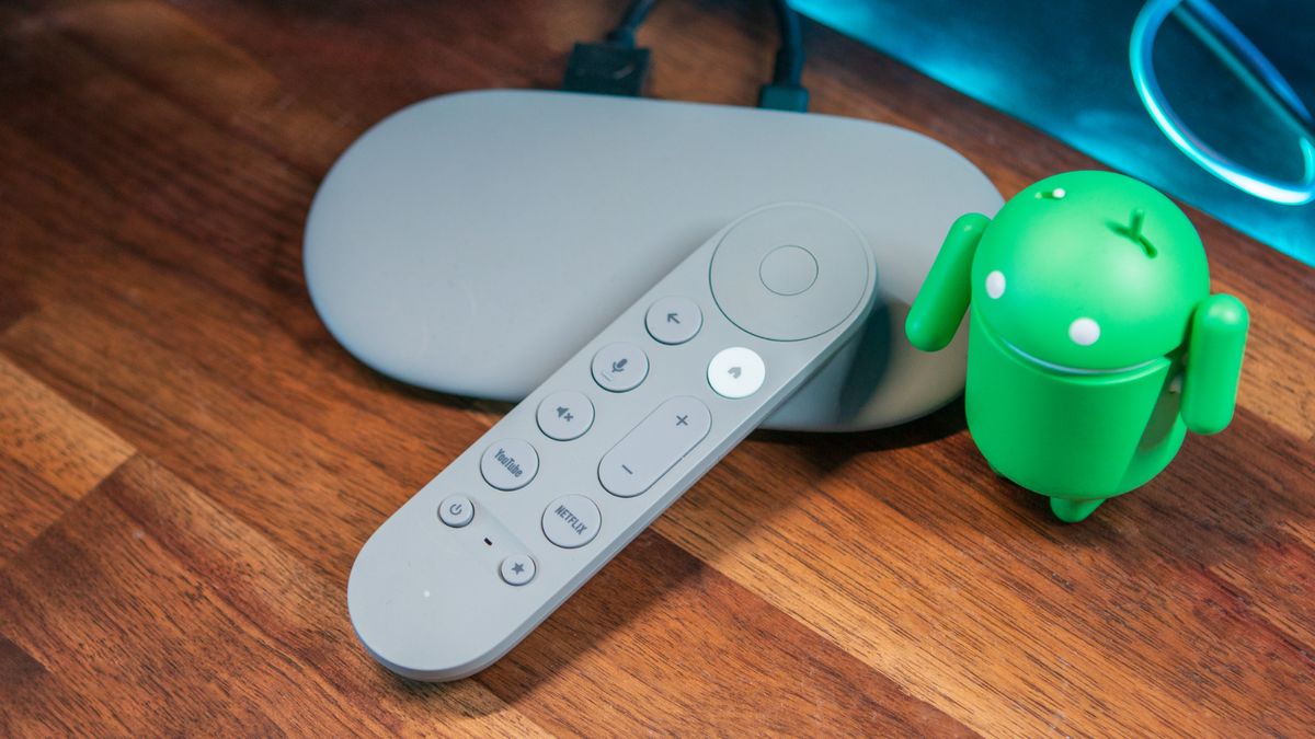 Google TV Streamer with Android figure and remote