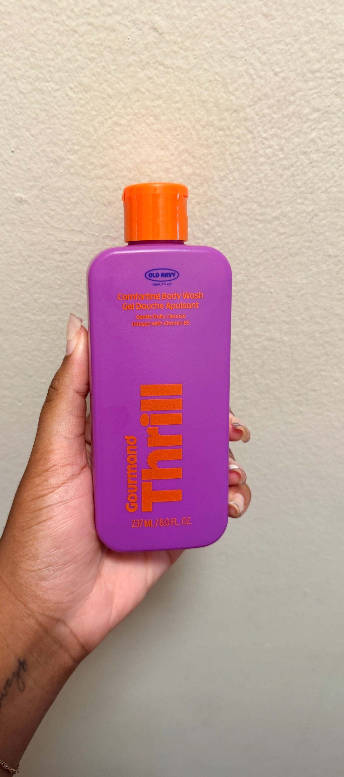 Ariel Baker testing Gourmand Thrill Body Wash from Old Navy Beauty.