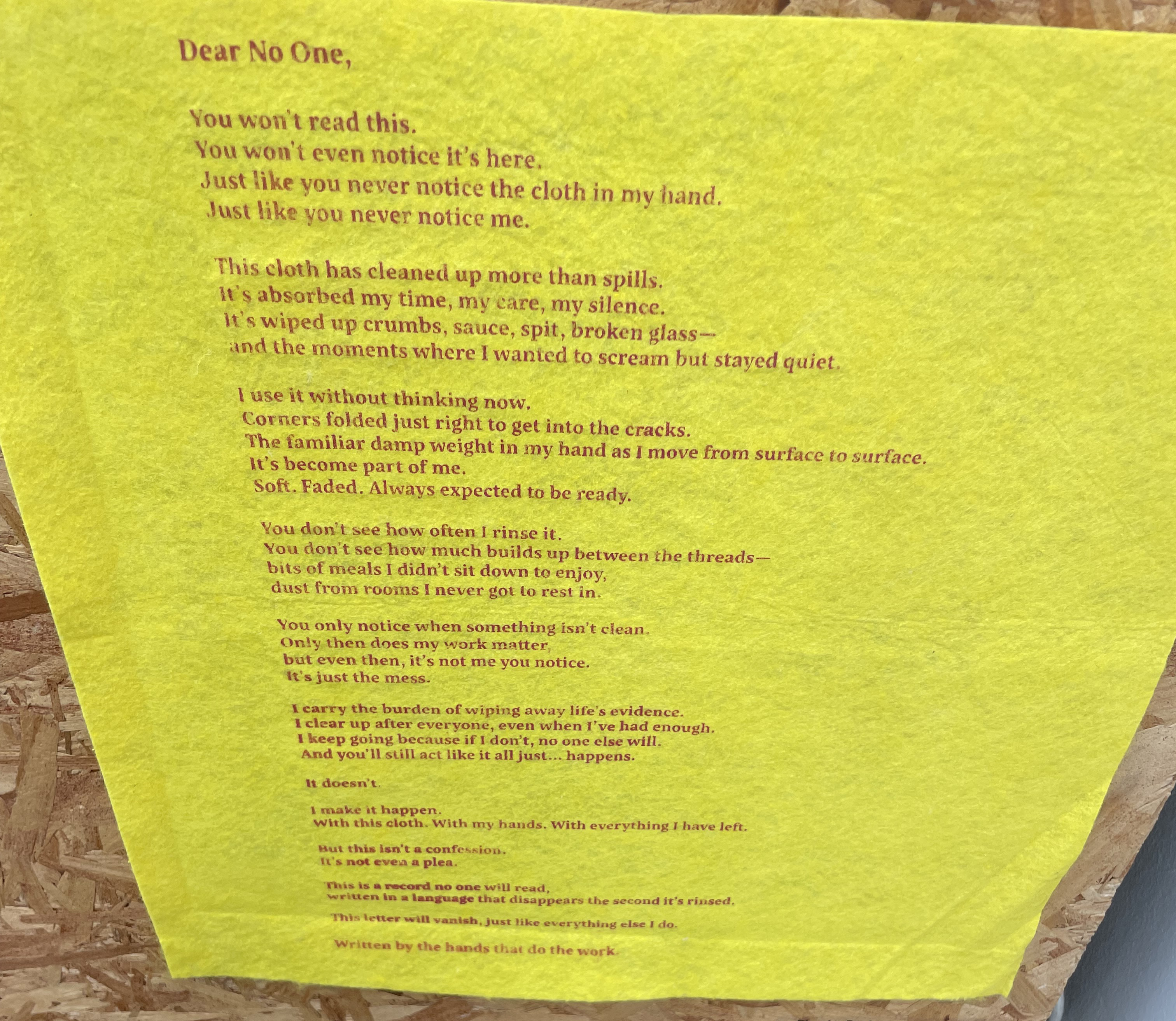 poem by Phoebe Peel about cleaning written on a yellow cloth