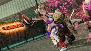 Juliet Starling saws through a zombie in Lollipop Chainsaw.