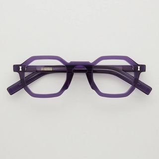purple geometric framed glasses
