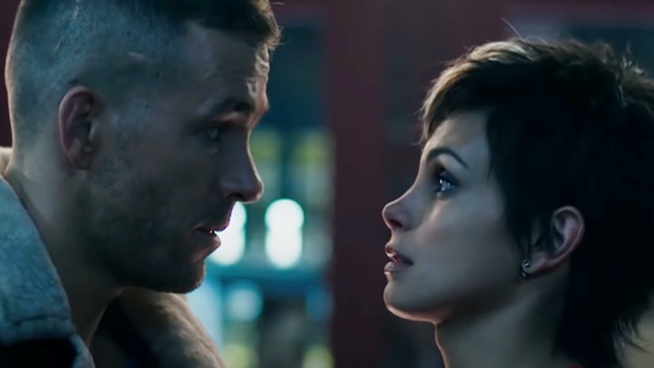Wade and Vanessa looking at each other in Deadpool.