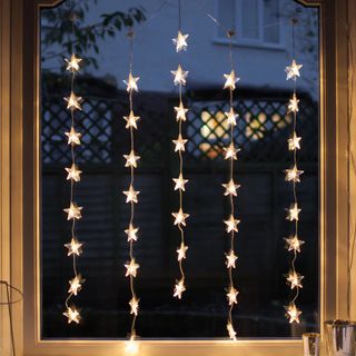 Lights4fun 40 Warm White LED Star Curtain Light