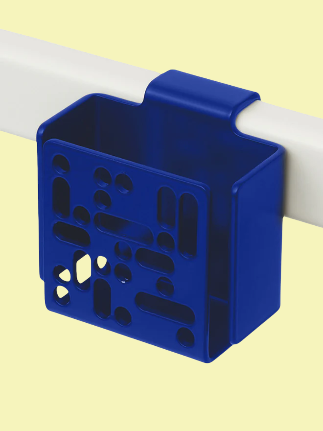 A cobalt blue remote control holder form Pedestal