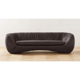 Black curved leather couch