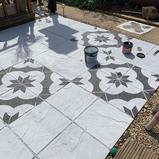 stenciled patio pattern in grey